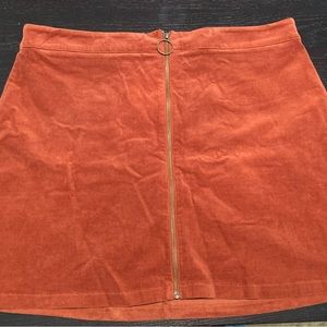 Forever 21- Womens size 2X, burnt orange, zip front corduroy skirt. NWT.